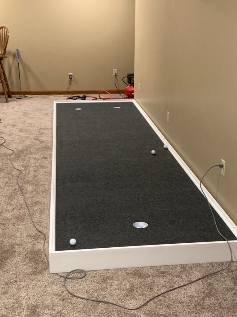 Finished indoor putting green.